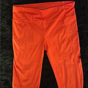 Size Medium Athleta Velocity Stash Pocket Capri Tight Leggings in Orange